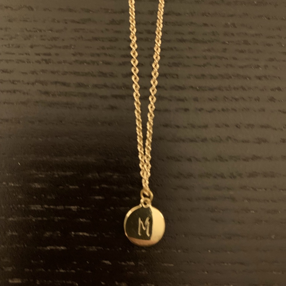 “M” initial necklace.